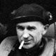 Ernie Pyle headshot with cigarette hanging out between his lips.